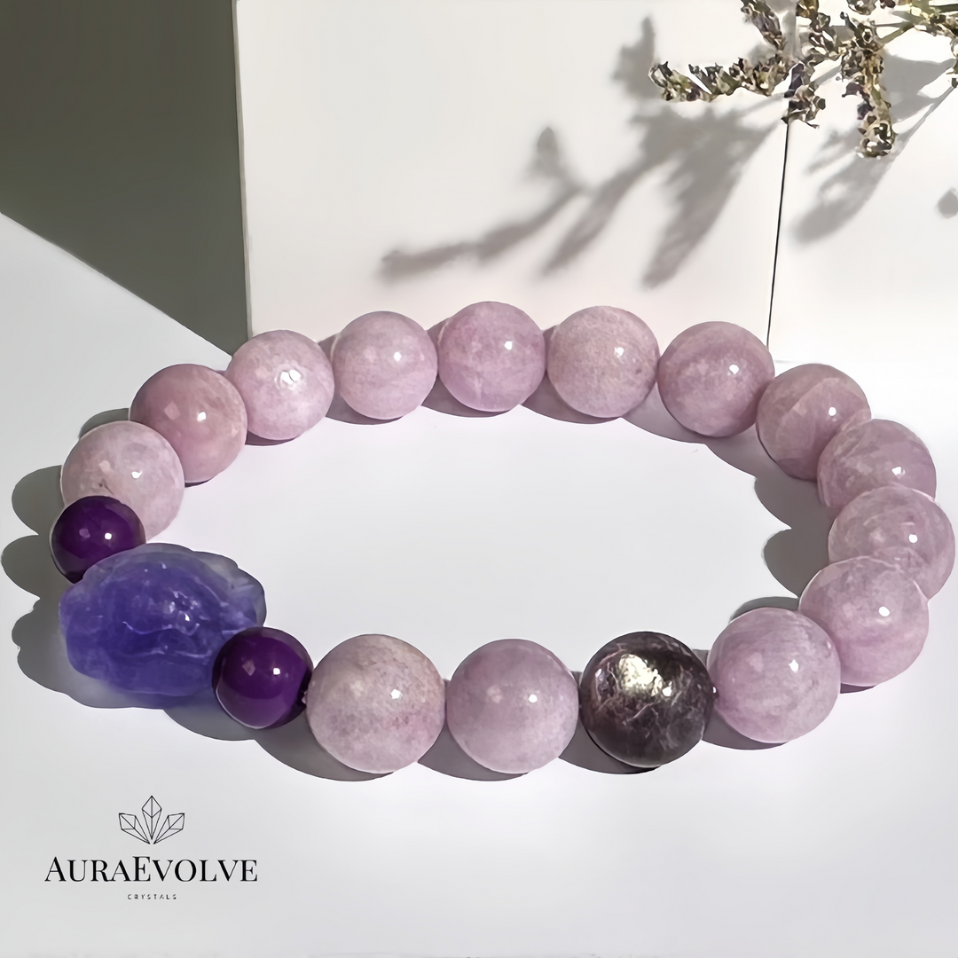 A crystal bracelet made with Kunzite, Phosphosiderite and Fluorite