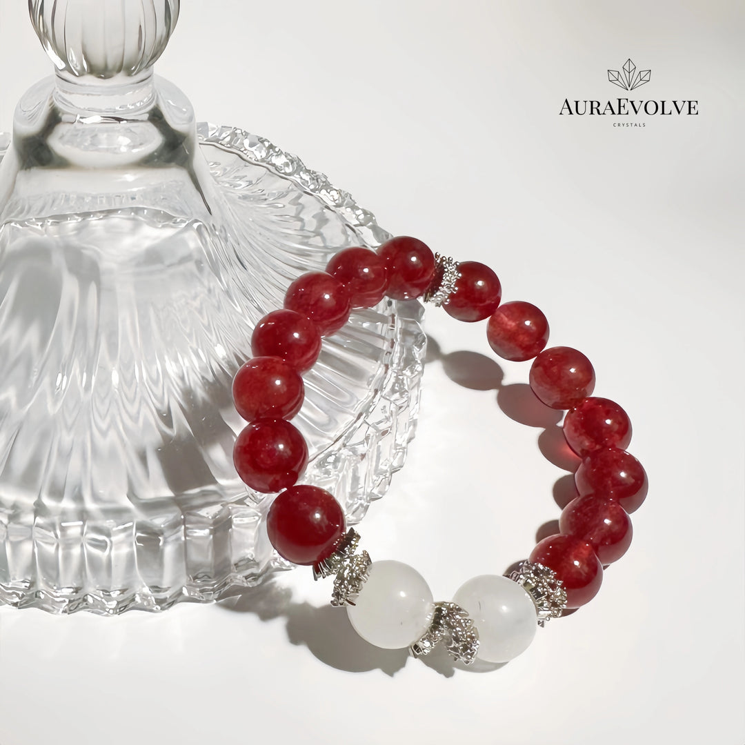 A crystal bracelet made with strawberry quartz and moonstone