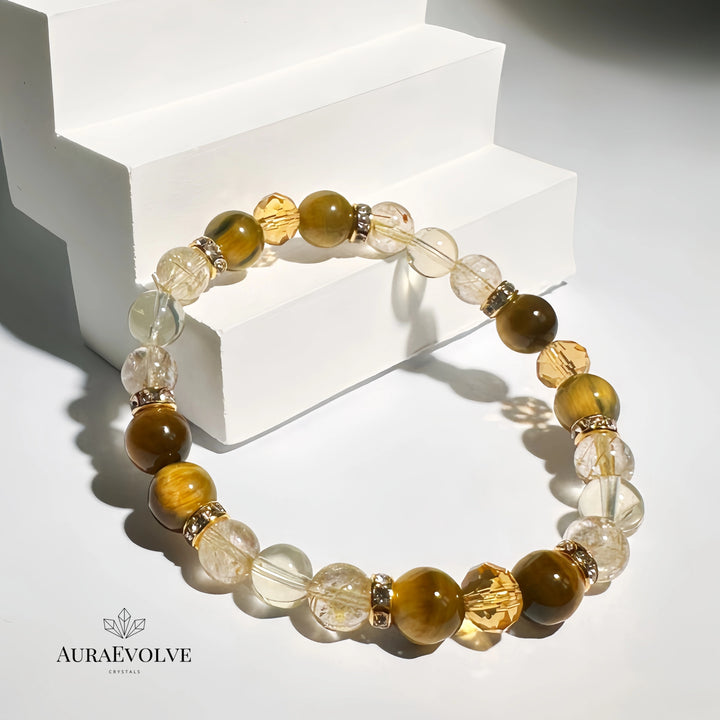 A crystal bracelet made with citrine, golden rutilated quartz and tigers eye