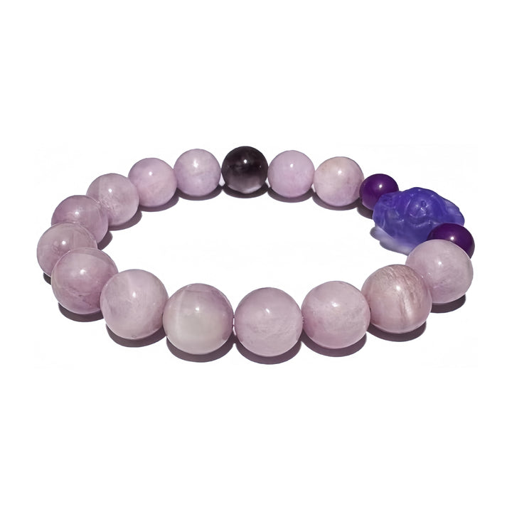 A crystal bracelet made with Kunzite, Phosphosiderite and Fluorite