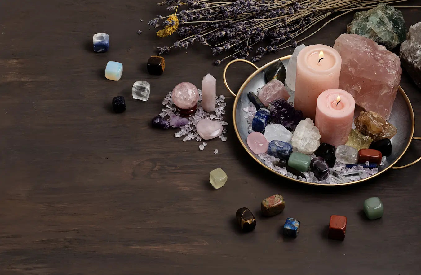 Candle and crystals on the desktop