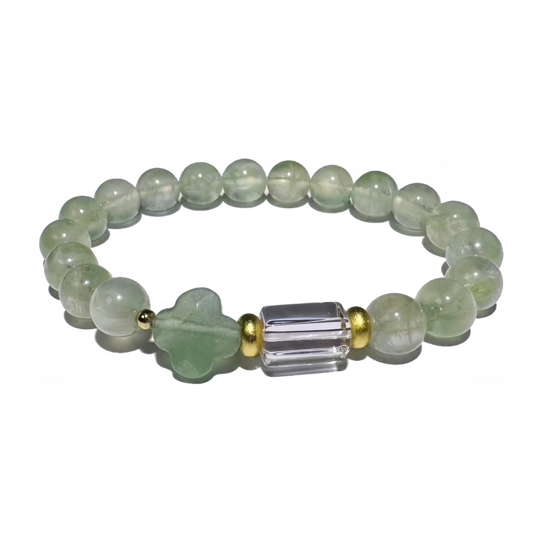 A crystal bracelet made with Prehnite and Clear Quartz