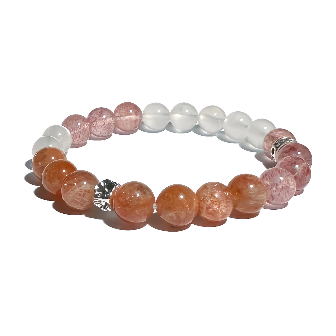 A crystal bracelet made with arusha sunstone and strawberry quartz and moonstone