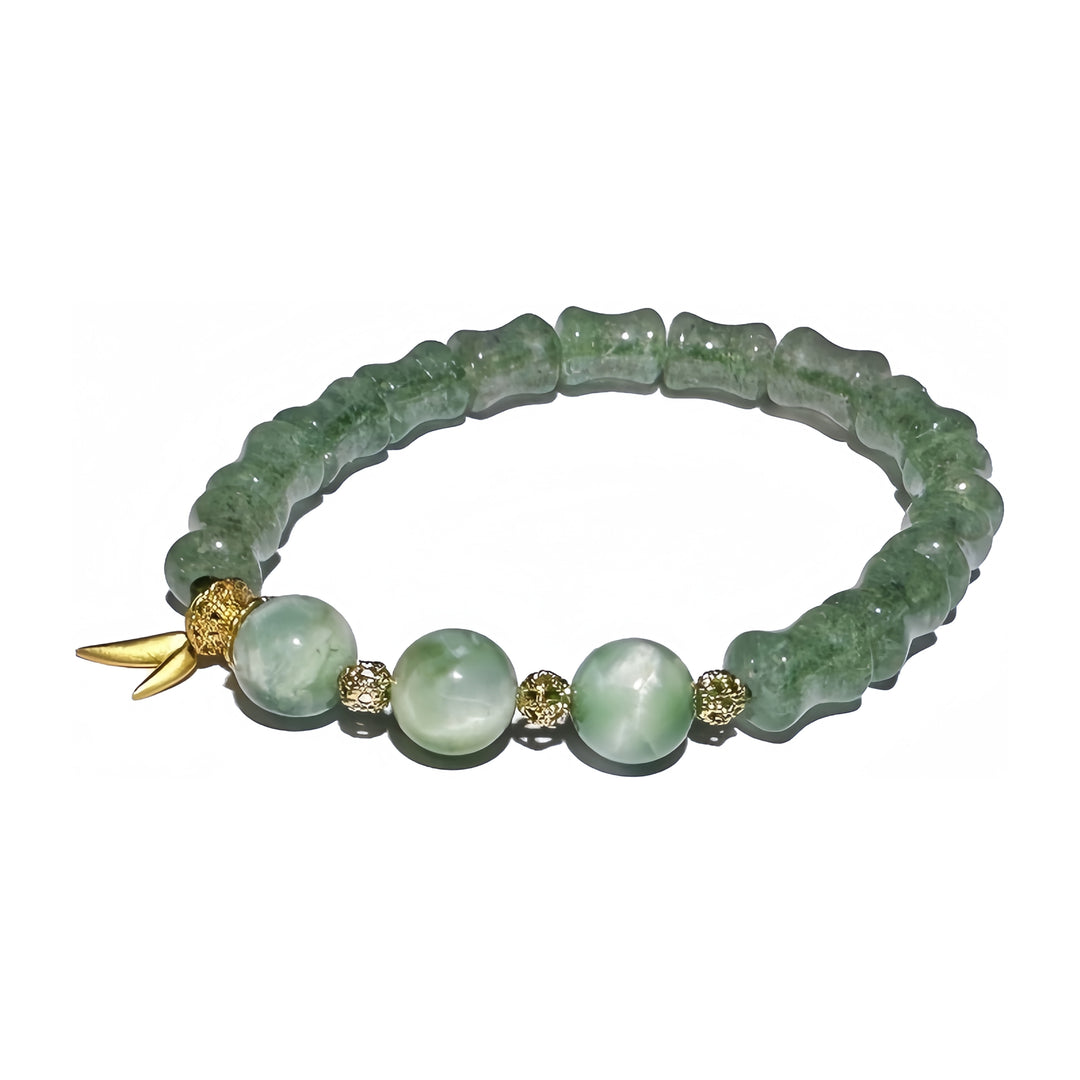 A crystal bracelet made with Green Larimar and Emerald Tanzberry Quartz