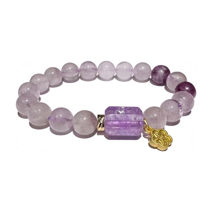 A crystal bracelet made with Lavender Amethyst and Purple Lepidolite